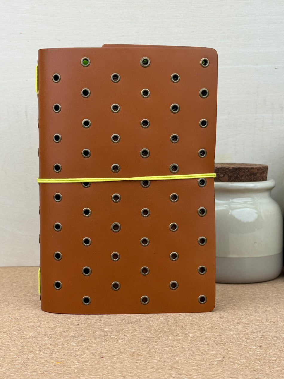 Imperfect Concepts Niko Leather Notebook - B6 Trifold - Cognac w/ Gunmetal Grommets