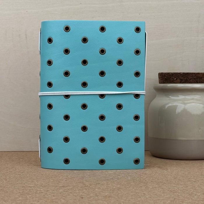 Imperfect Concepts Max Notebook - A6 Bifold - Turquoise w/ Bronze Grommets
