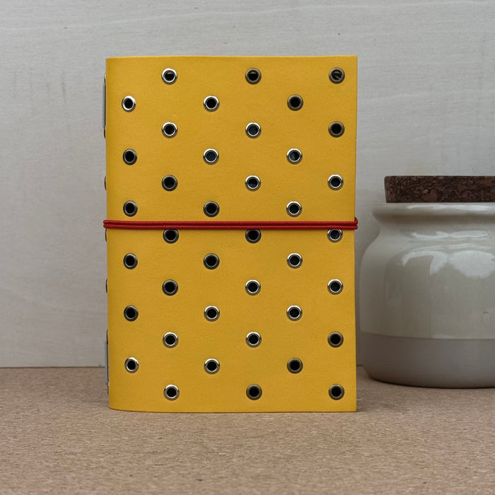 Imperfect Concepts Max Notebook - A6 Bifold - Zest w/ Mixed Metal Grommets - Scarlet Band