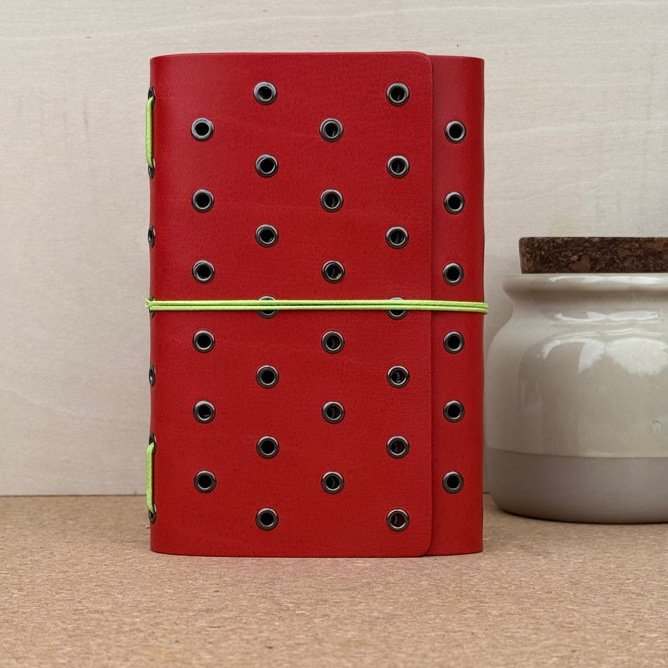 Imperfect Concepts Juniper Notebook - A6 Trifold - Scarlet w/ Gunmetal Grommets