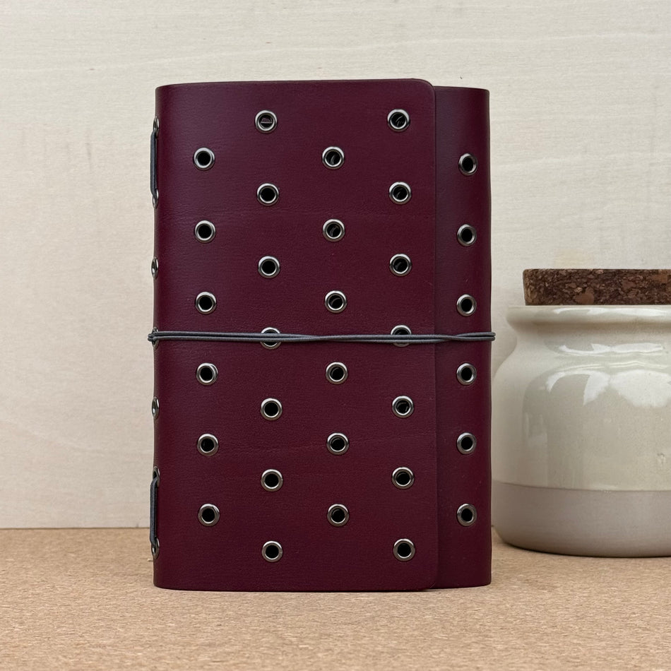 Imperfect Concepts Juniper Notebook - A6 Trifold - Maroon w/ Gunmetal Grommets