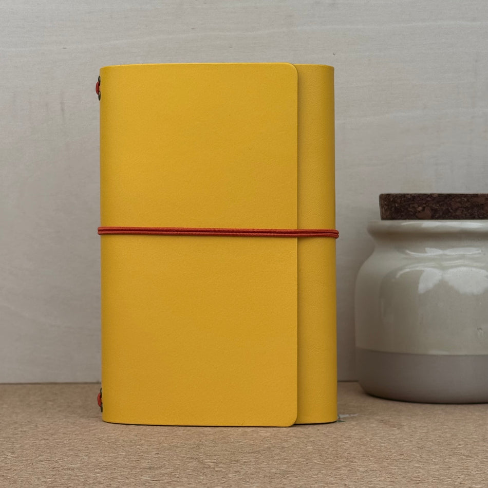 Imperfect Concepts Jasper Notebook - A6 Trifold - Zest w/ Orange Band