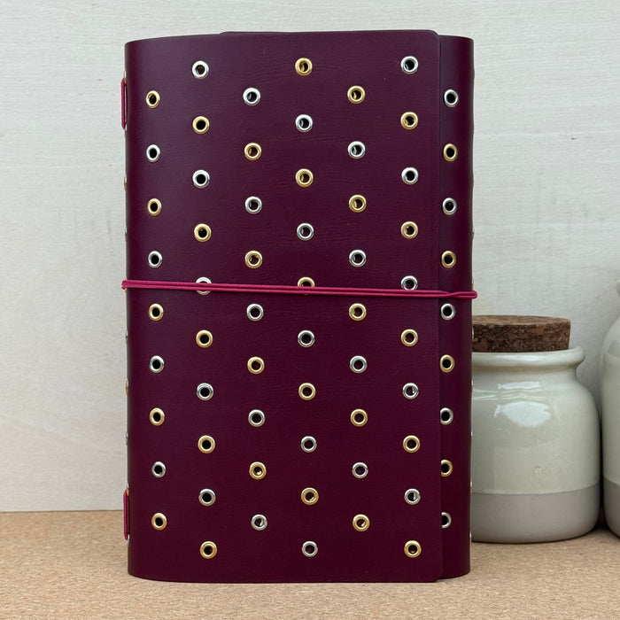 Imperfect Concepts Dancer Notebook - A5 Trifold - Maroon w/ Mixed Metal Grommets